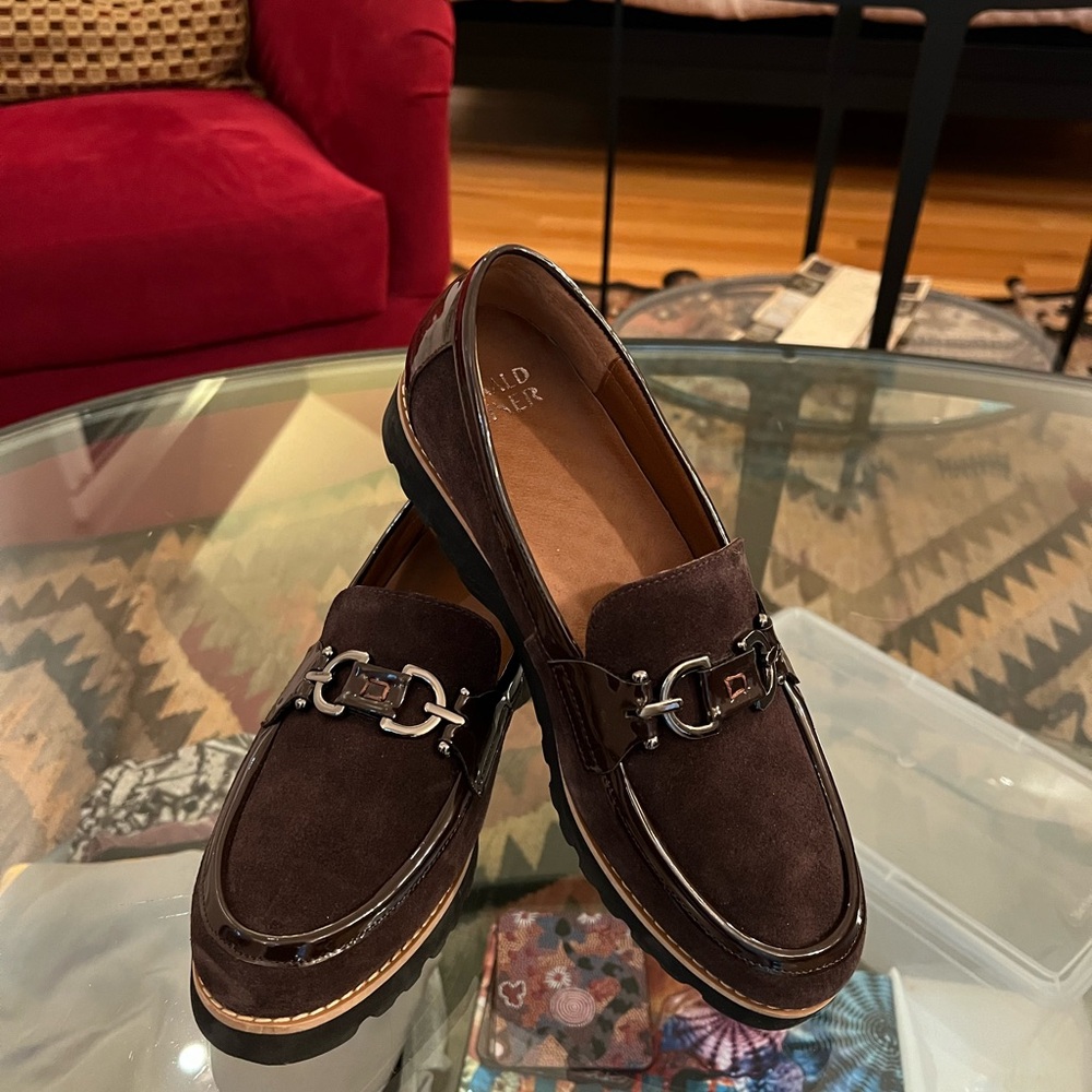 Donald Pliner suede and patent loafer with lug sole.